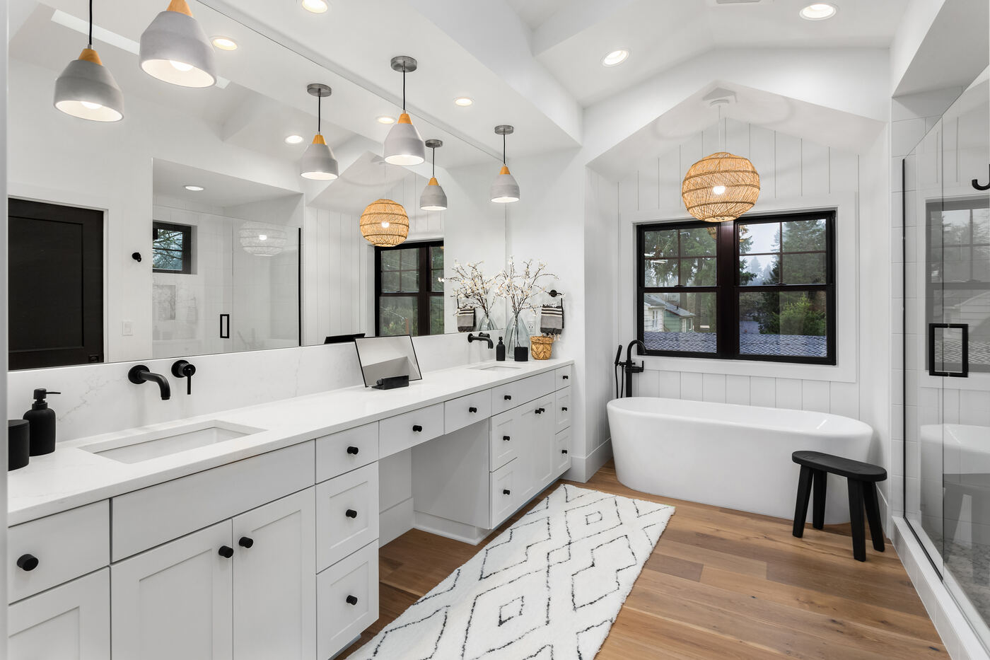 Modern master bath renovation with floating vanity and backlit mirror — Houston Texas