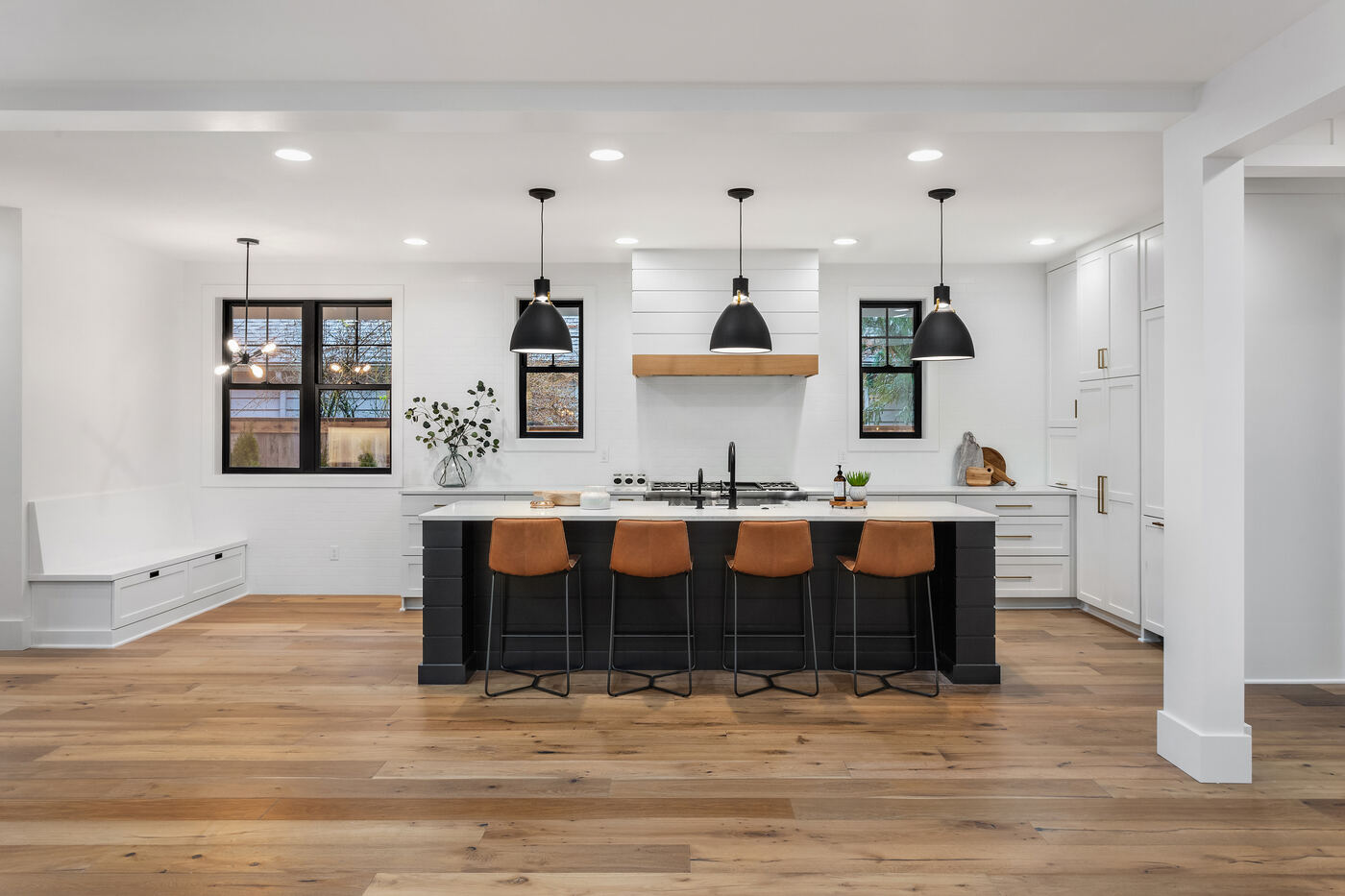 Kitchen renovation with quartz island and custom cabinetry